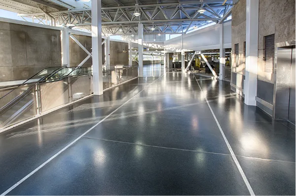 A building featuring flooring systems and solutions, including an escalator.
