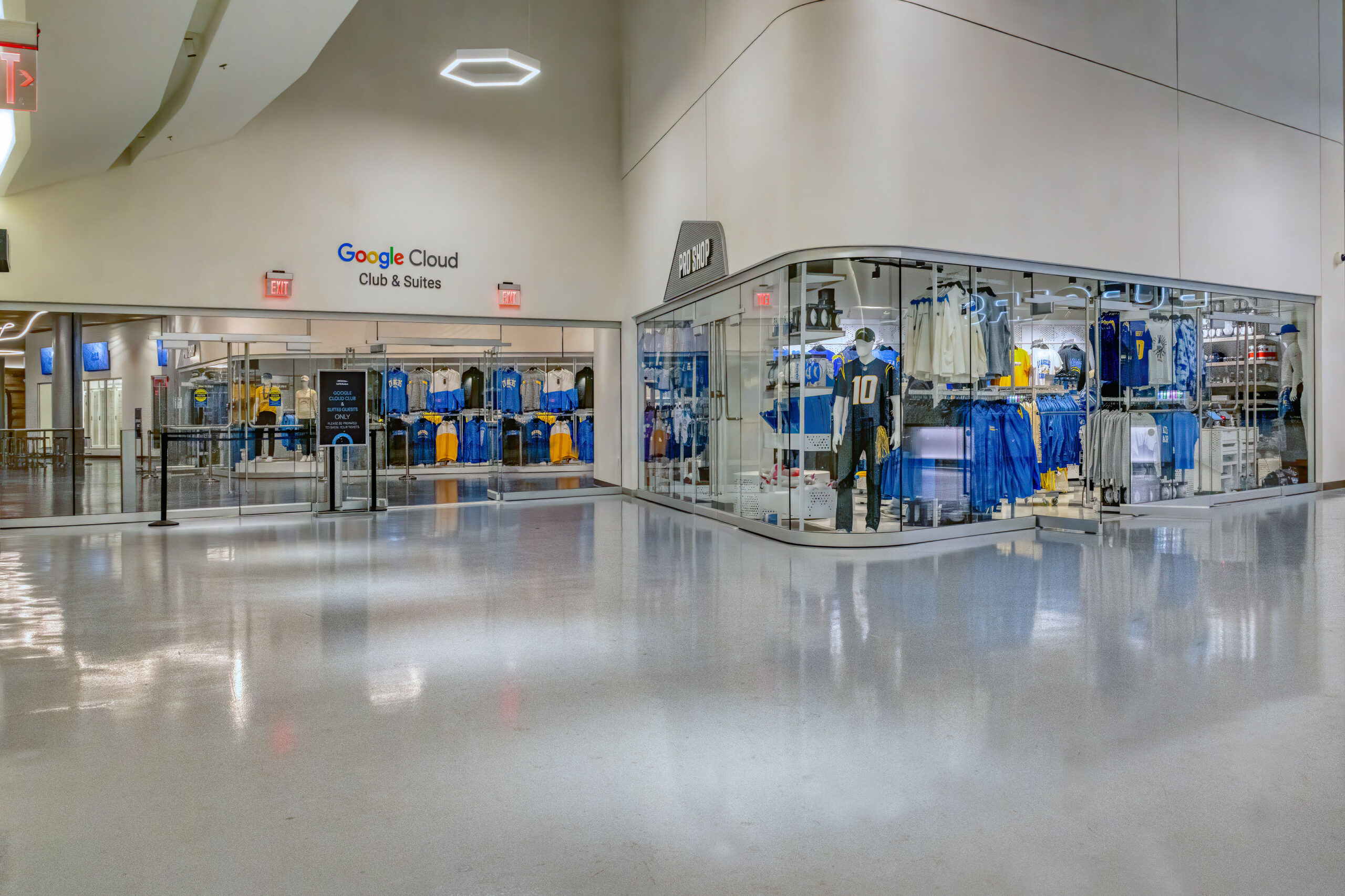 A blue and white store with a lot of commercial merchandise.