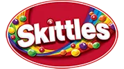 Skittles logo featuring the brand name in white letters on a red oval background with colorful candy pieces and a rainbow swirl.