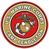 The official emblem of U.S. Marine Corps Camp Pendleton, featuring the Marine Corps logo on a red background with a circular border.