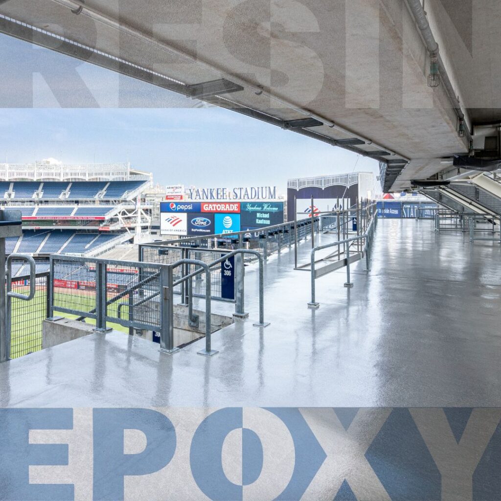 View of a clean, shiny concourse area at Yankee Stadium with visible seating and field in the background; large text "RESIN EPOXY" overlays the image, highlighting the durability seen in Resin Flooring vs Epoxy Flooring solutions.