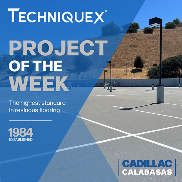 Empty parking lot with new resinous flooring, light poles, and a hillside in the background. Overlay text highlights it as Techniquex’s project of the week for Cadillac Calabasas.