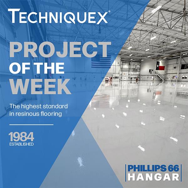 Large aircraft hangar with polished resinous flooring, labeled as TechniqueX Project of the Week for Phillips 66 Hangar, with text noting company established in 1984.